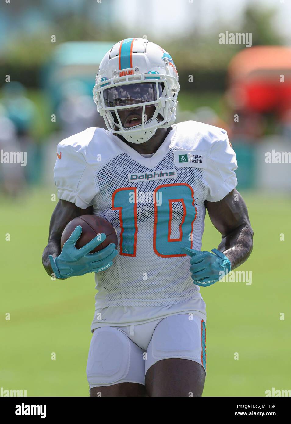 Miami. FL USA;  Wide receiver Tyreek Hill (10) runs drills during Miami Dolphins Training Camp, Saturday, August 6, 2022, at Baptist Health Training C Stock Photo