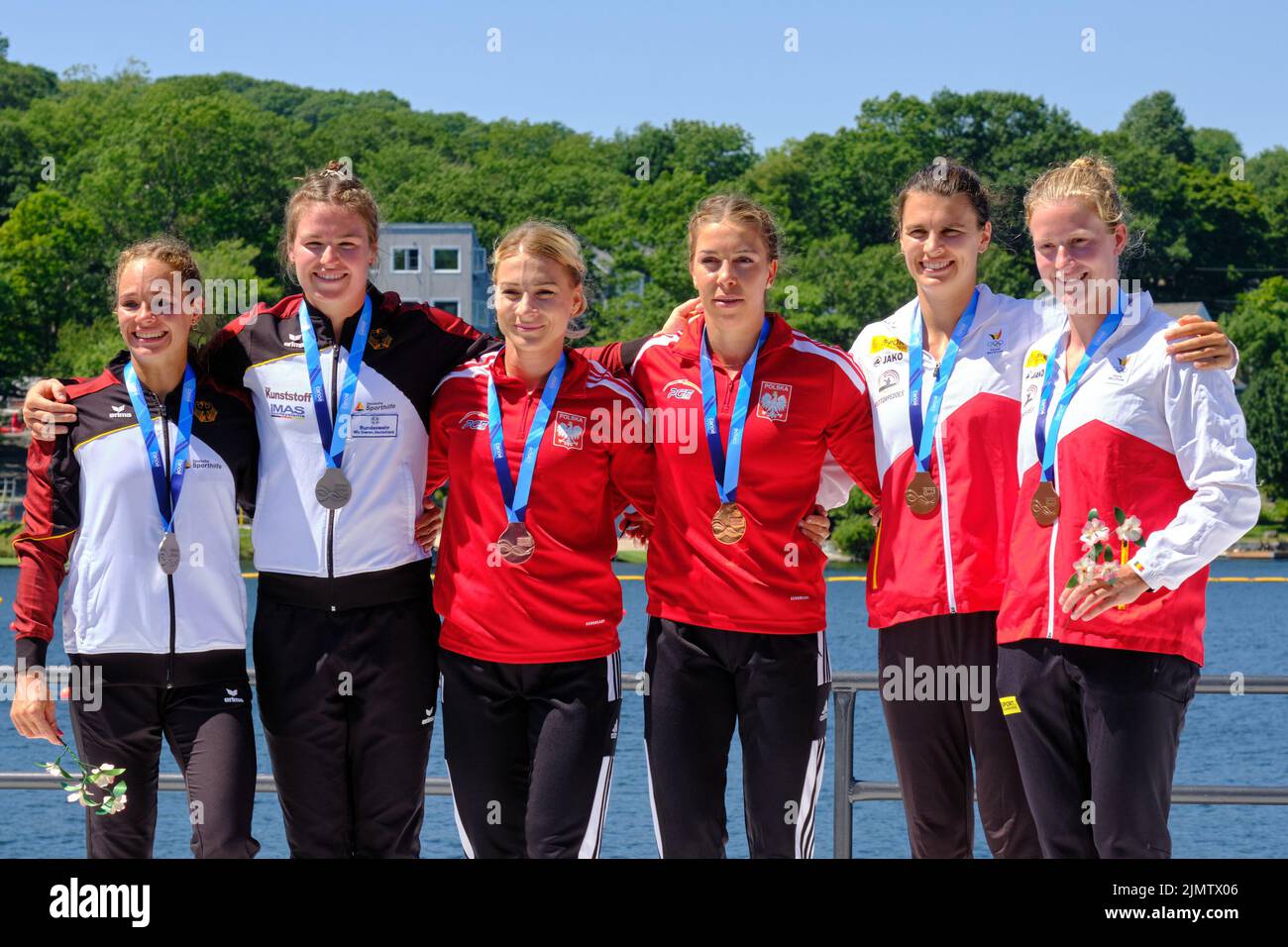 Dartmouth, Canada. August 7th, 2022. Women K2 500m World Championship Podium, Champion Karolina Naja and Anna Pulawska from Poland take Gold, Paulina Paske and Jule Hake from Germany take Silver, and Hemrmien Peters and Lise Broekx from Belgium taking the Bronze. The 2022 ICF Canoe Sprint and Paracanoe World Championships takes place on Lake Banook in Dartmouth (Halifax). Credit: meanderingemu/Alamy Live News Stock Photo