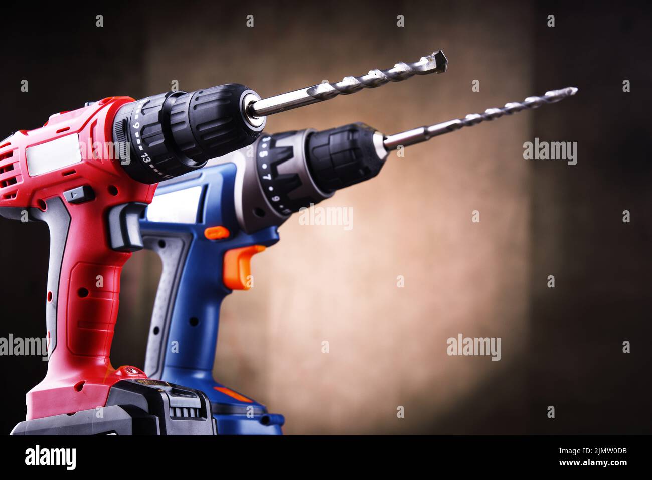 Composition with two cordless drills also working as screw guns Stock Photo