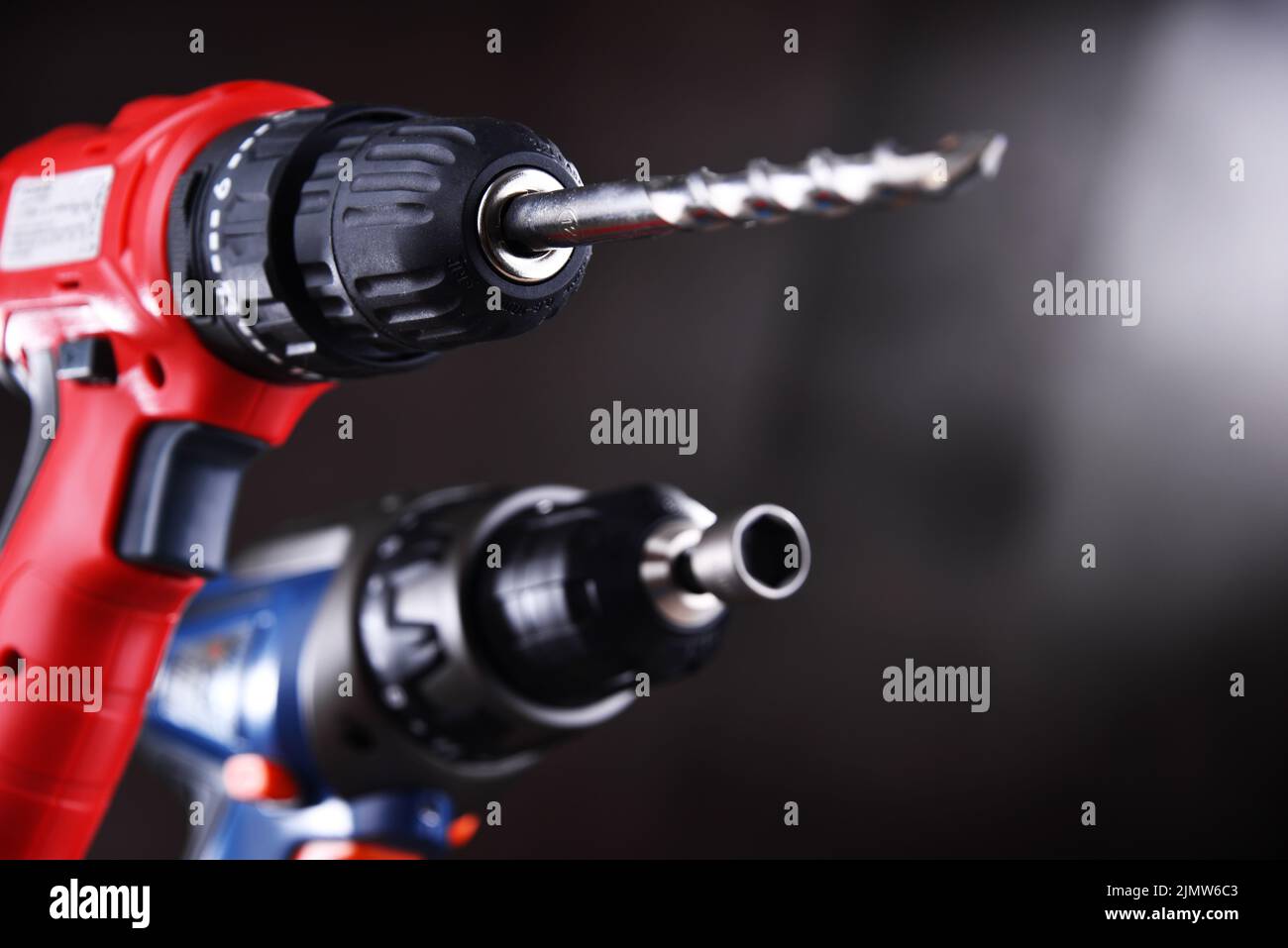 A pistolgrip cordless drill and a screw gun Stock Photo Alamy
