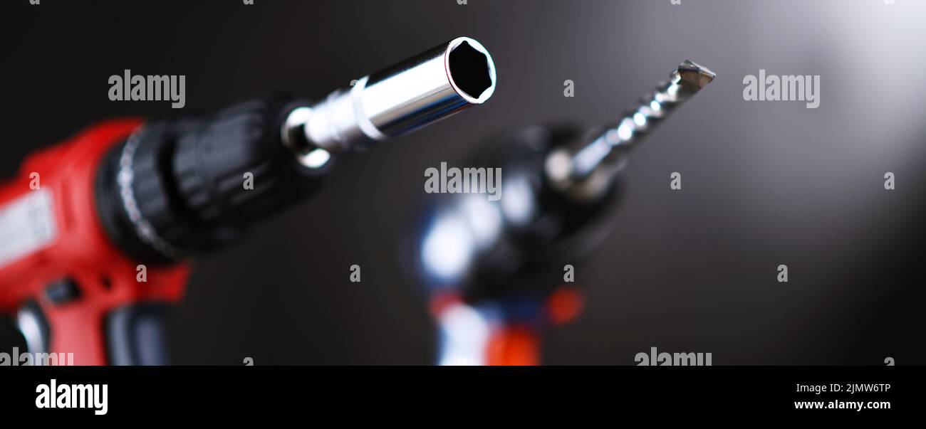 A screw gun and a pistol-grip cordless drill. Stock Photo