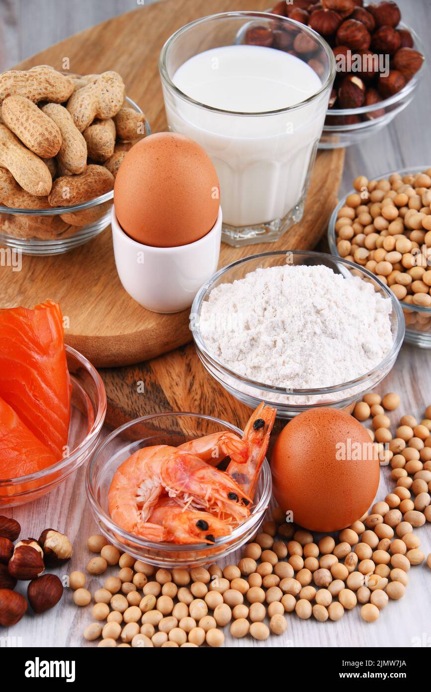 Composition with common food allergens including egg, milk, soya, peanuts, hazelnut, fish, seafood and wheat flour Stock Photo