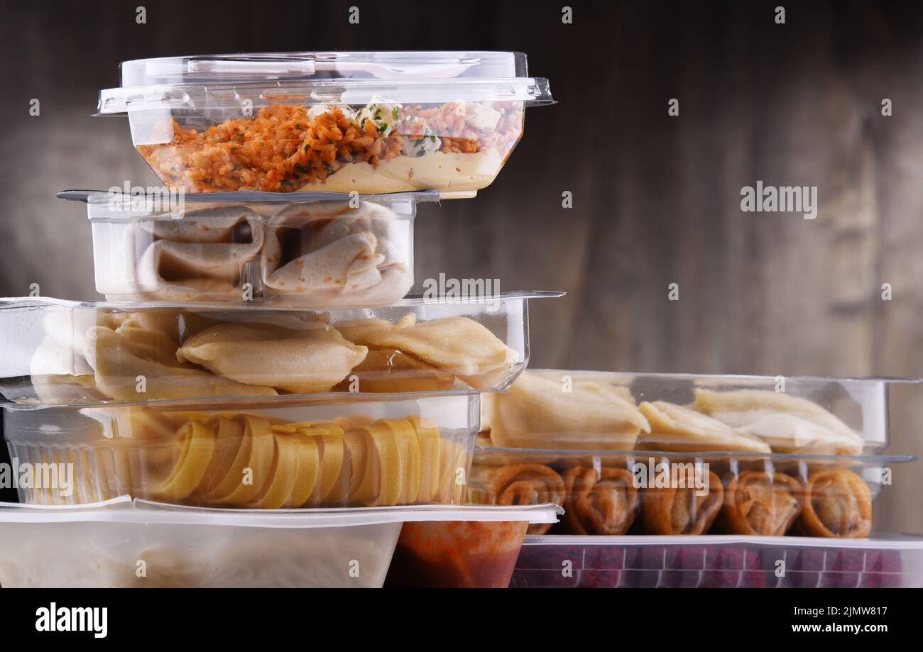 A variety of prepackaged food products in plastic boxes. Stock Photo