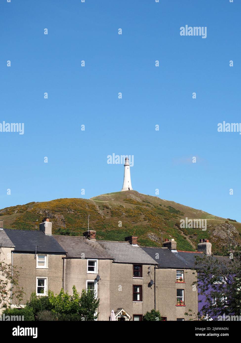 Hoad hill and historic 19th century monument in Ulverston with surrounding town houses Stock Photo