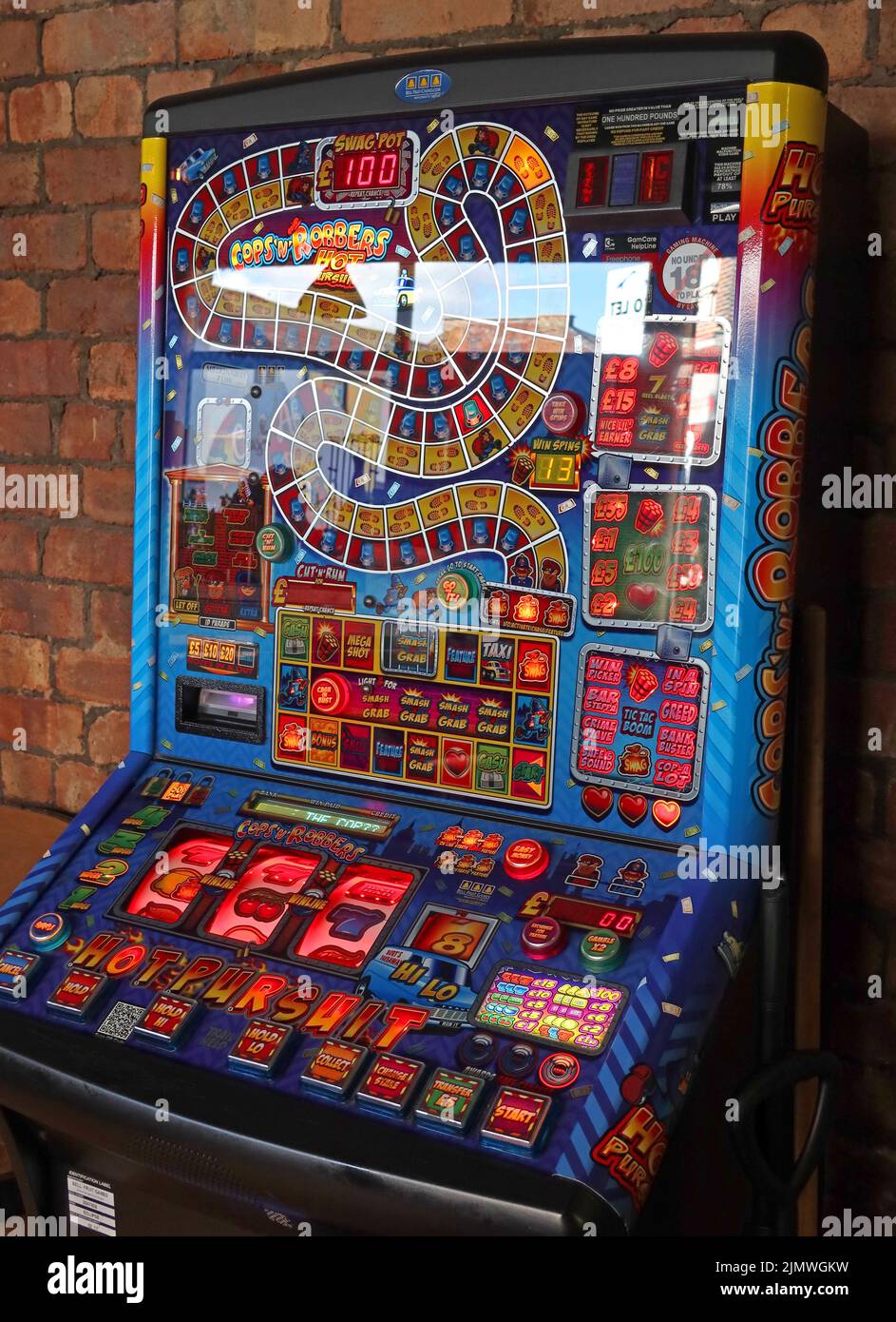 Cops and Robbers,pub fruit machine, Warrington, Cheshire, England,UK, WA1 Stock Photo