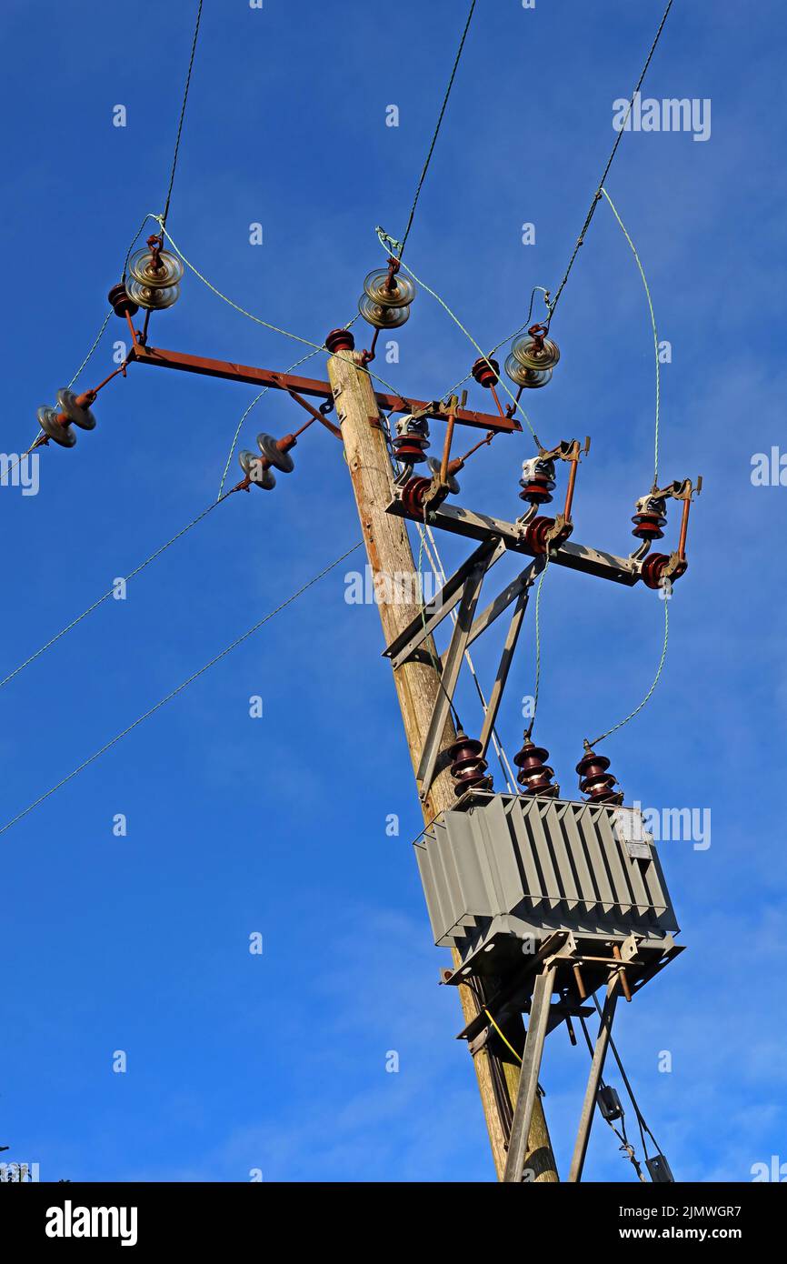 Rural electrical power distribution, step-down transformer near Grappenhall, Warrington, Cheshire, England, UK, WA4 Stock Photo