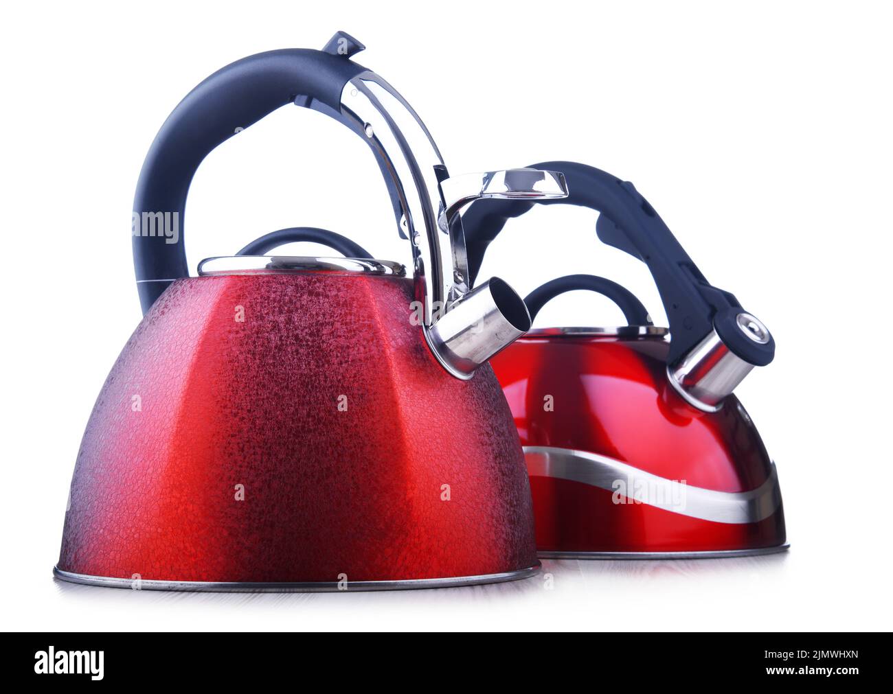 Traditional stainless steel stovetop kettles with whistle isolated on