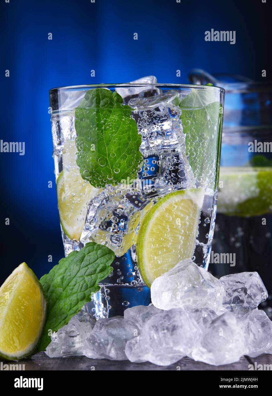 Glass of mineral water with ice Stock Photo - Alamy
