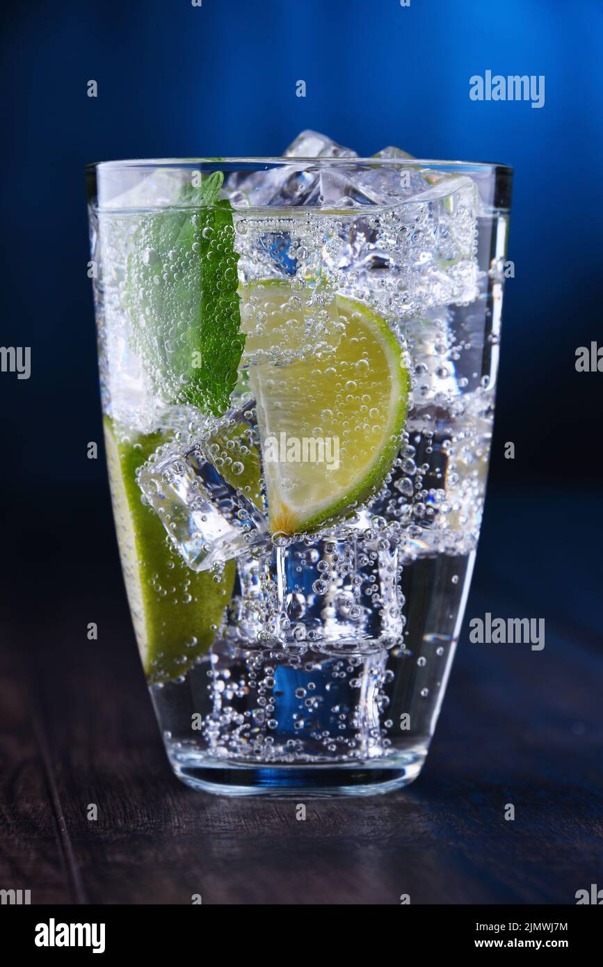 Glass of mineral water with ice Stock Photo - Alamy