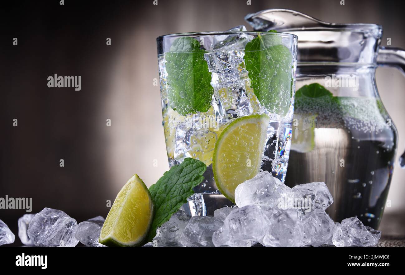 Glass of mineral water with ice Stock Photo - Alamy