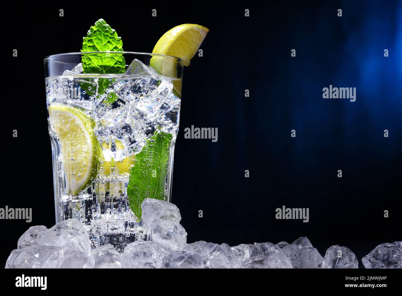 Glass of mineral water with ice Stock Photo - Alamy