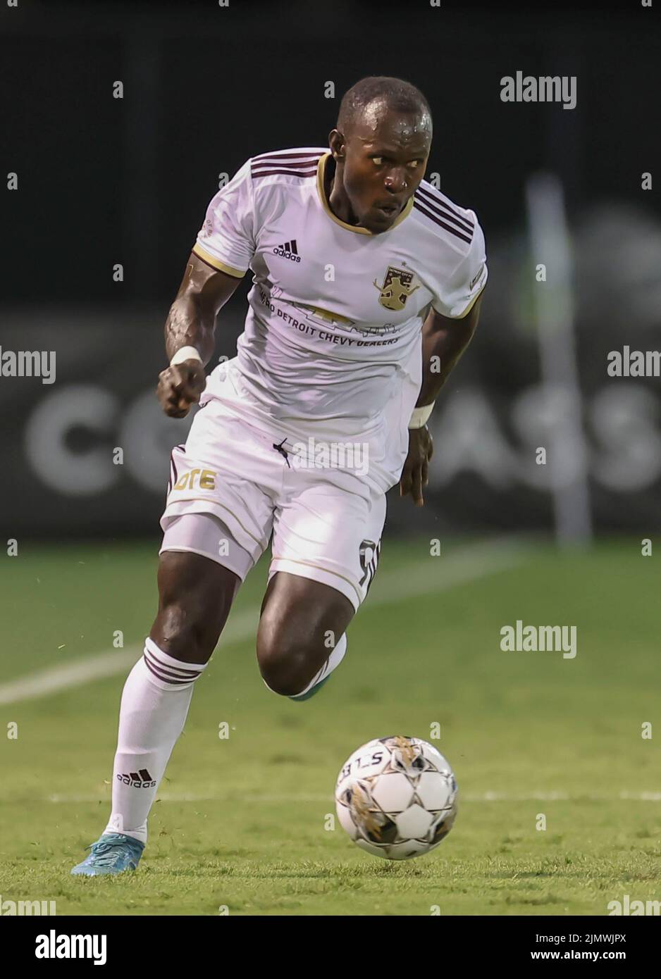 St. Petersburg, FL: Detroit City forward Francis Atuahene (9) dribbles the ball up the pitch during a USL soccer game against the Tampa Bay Rowdies, S Stock Photo