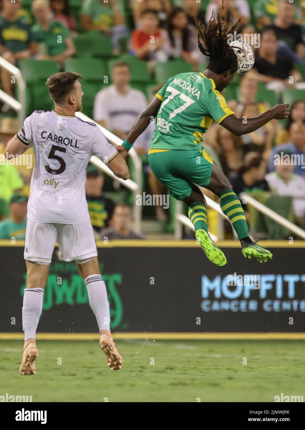 St. Petersburg, FL: Tampa Bay Rowdies forward Lucky Mkosana (77) heads the ball during a USL soccer game against Detroit City, Saturday, August 6, 202 Stock Photo