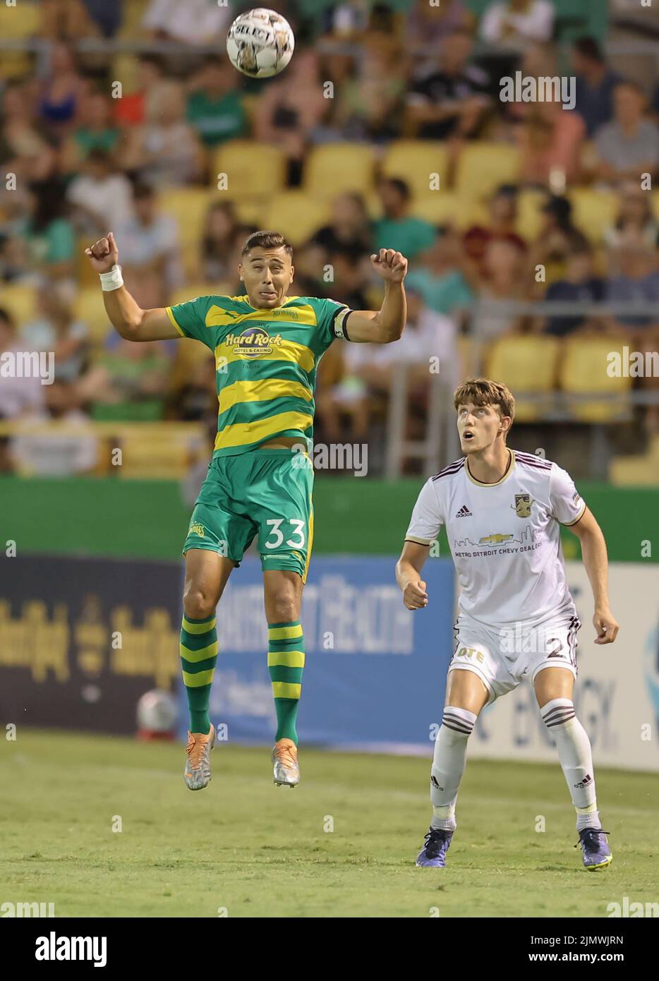 St. Petersburg, FL: Tampa Bay Rowdies defender Aaron Guillen (33) heads the ball during a USL soccer game against Detroit City, Saturday, August 6, 20 Stock Photo