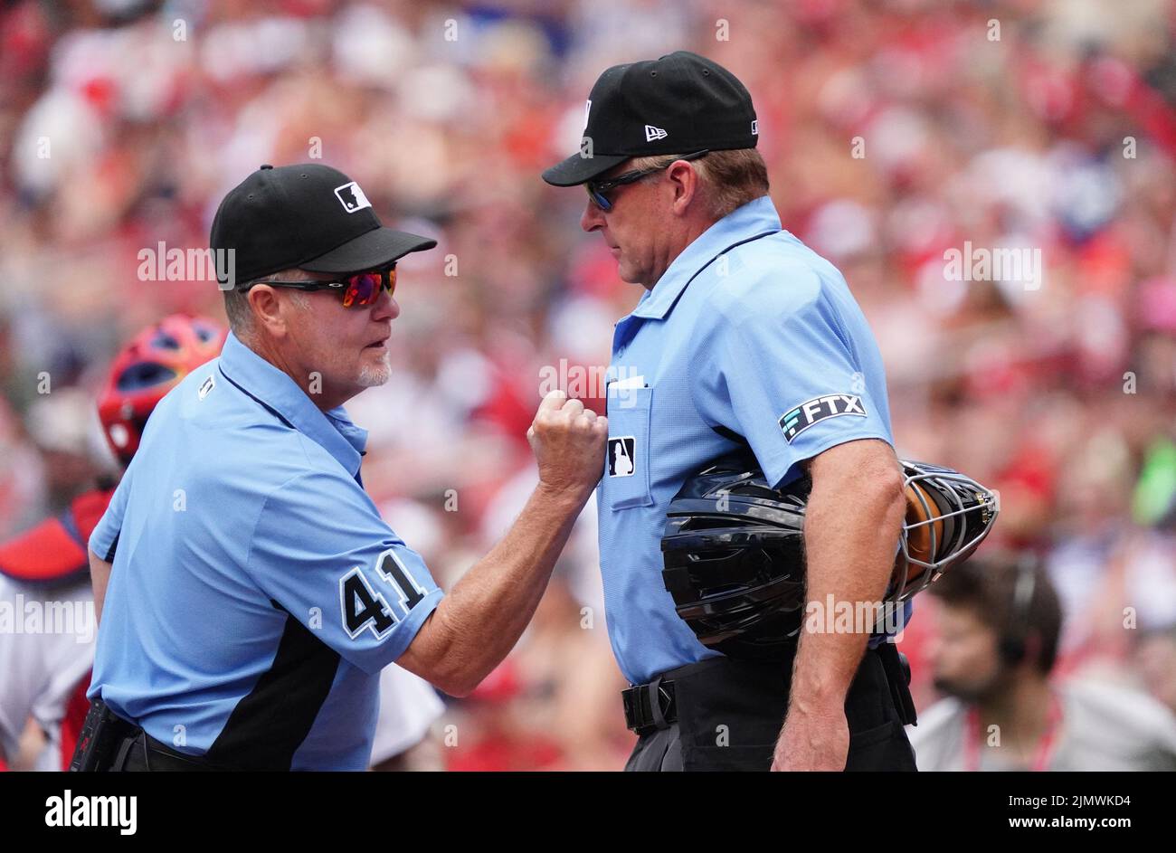 St. Louis, United States. 07th Aug, 2022. Umpire Jerry Meals (L) beats on the chest of home plate umpire Ed Hickox for good luck before the New York Yankees-St. Louis Cardinals baseball game at Busch Stadium in St. Louis on Sunday, August 7, 2022. Photo by Bill Greenblatt/UPI Credit: UPI/Alamy Live News Stock Photo