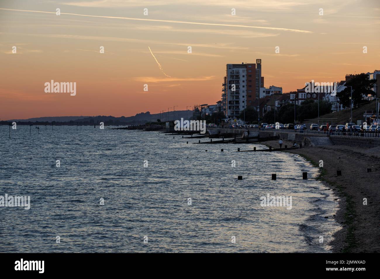 English beach sunset. A view of Westcliff beach to Chalkwell, Essex on a hot summer's day at sunset during the UK heatwave of 2022 Stock Photo