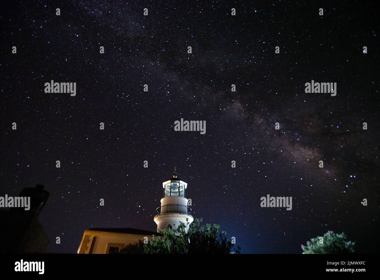 Gavdos. 31st July, 2022. Photo taken on July 31, 2022 shows the night sky and the Milky Way above a lighthouse at Gavdos island in Greece. Credit: Marios Lolos/Xinhua/Alamy Live News Stock Photo
