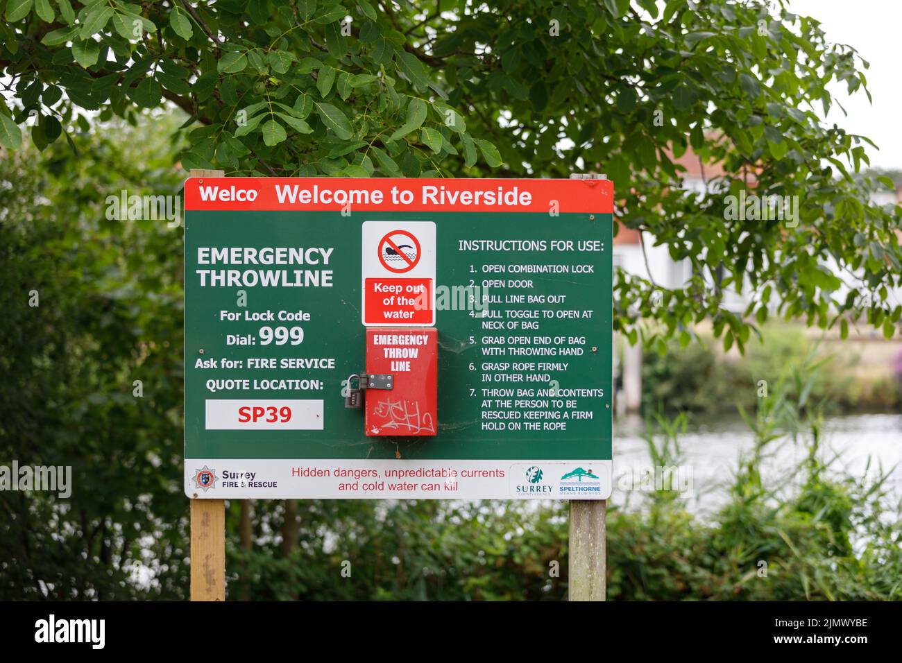 An emergency throwline  and instruction sign by the River Thames in Staines, England Stock Photo