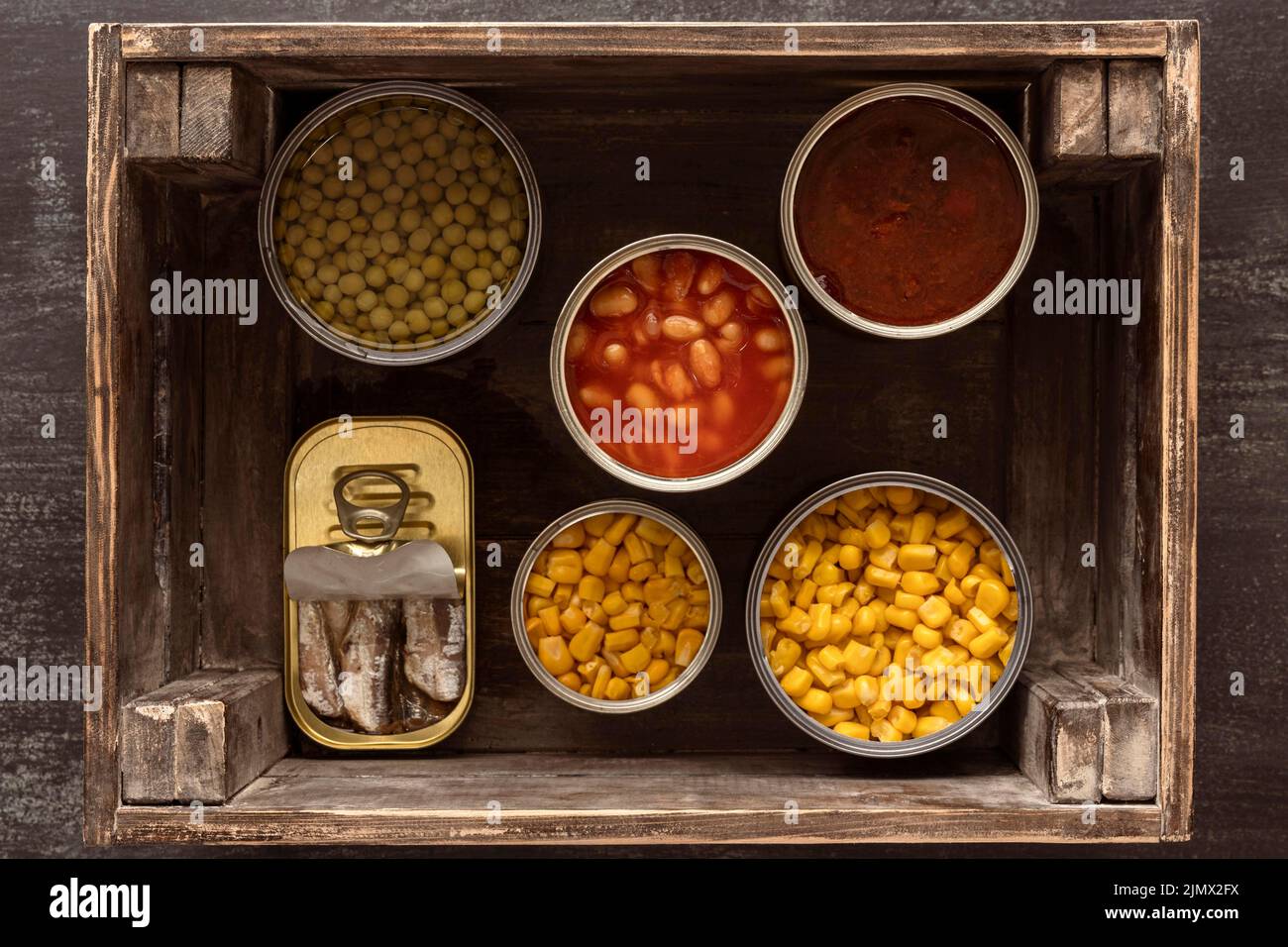 Top view preserved food cans wooden crate Stock Photo