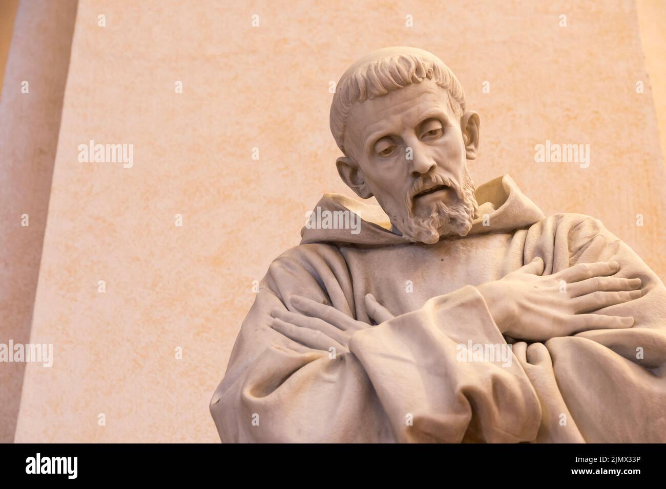 Assisi village in Umbria region, Italy. Statue of St. Francis. The town is famous for the most important Italian Basilica dedica Stock Photo