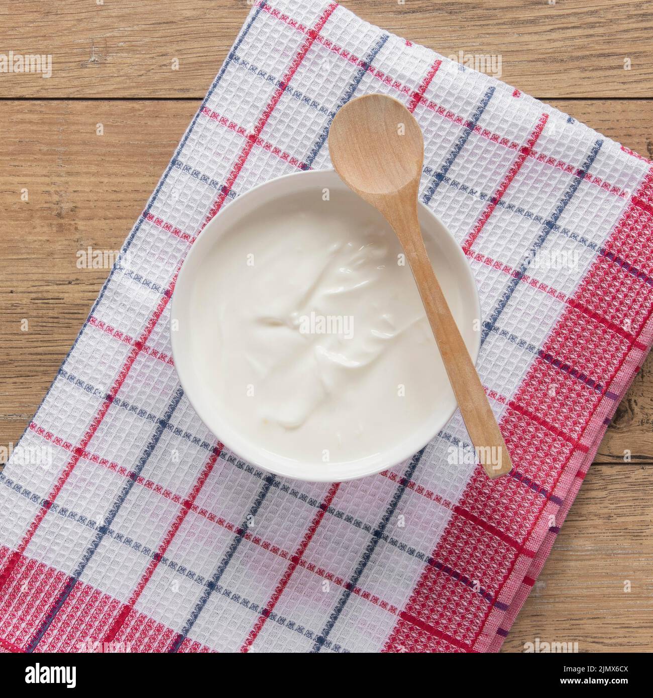 Flat lay yogurt bowl composition Stock Photo
