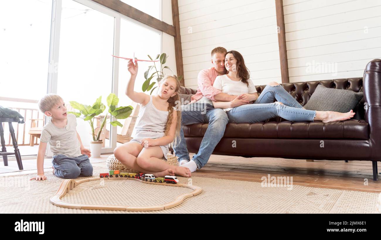 Full shot family living room Stock Photo