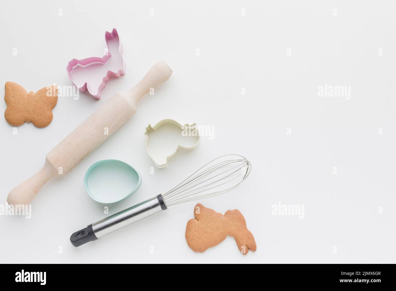 Flat lay kitchen utensils bunny shaped forms cookies Stock Photo