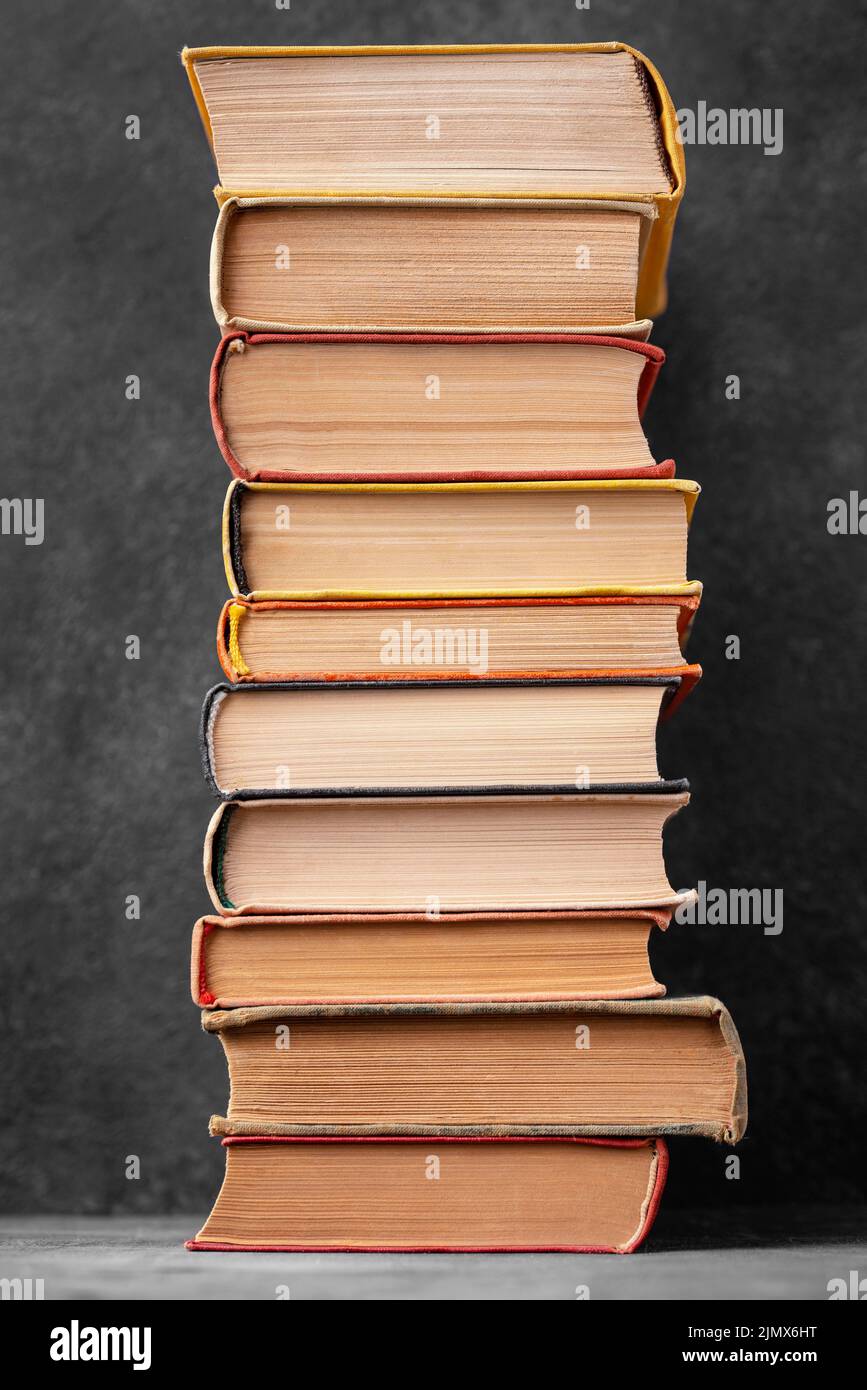 Front view stack different books Stock Photo