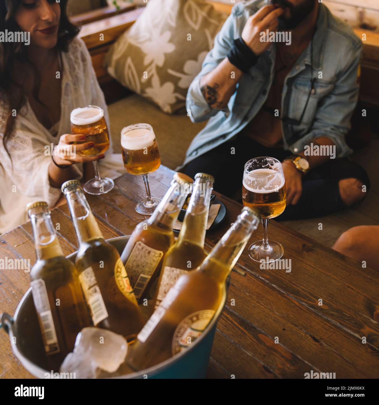 Friends with beers bucket Stock Photo