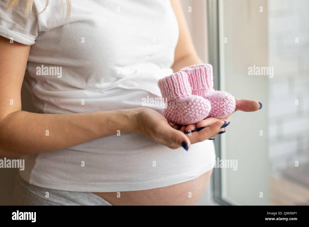 Front view baby pink shoes Stock Photo - Alamy