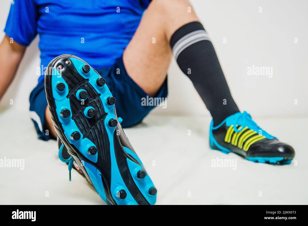 Football player relaxing shoe view Stock Photo