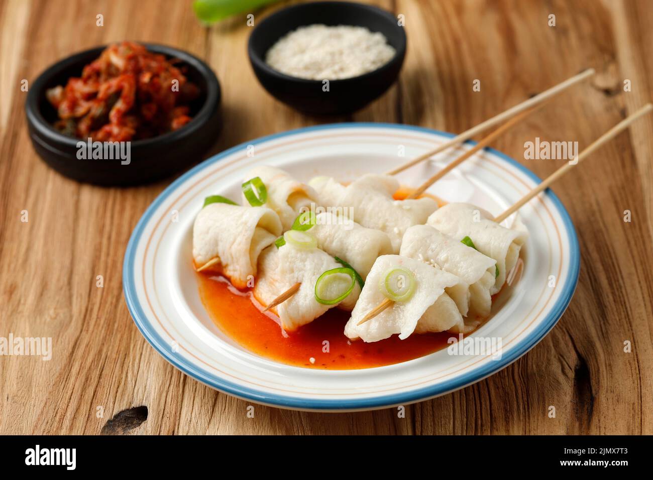 Odeng Guk Skewered Korean  Fishcake in Spicy Broth. Popular Korean Street Food with Tteokbokki Stock Photo
