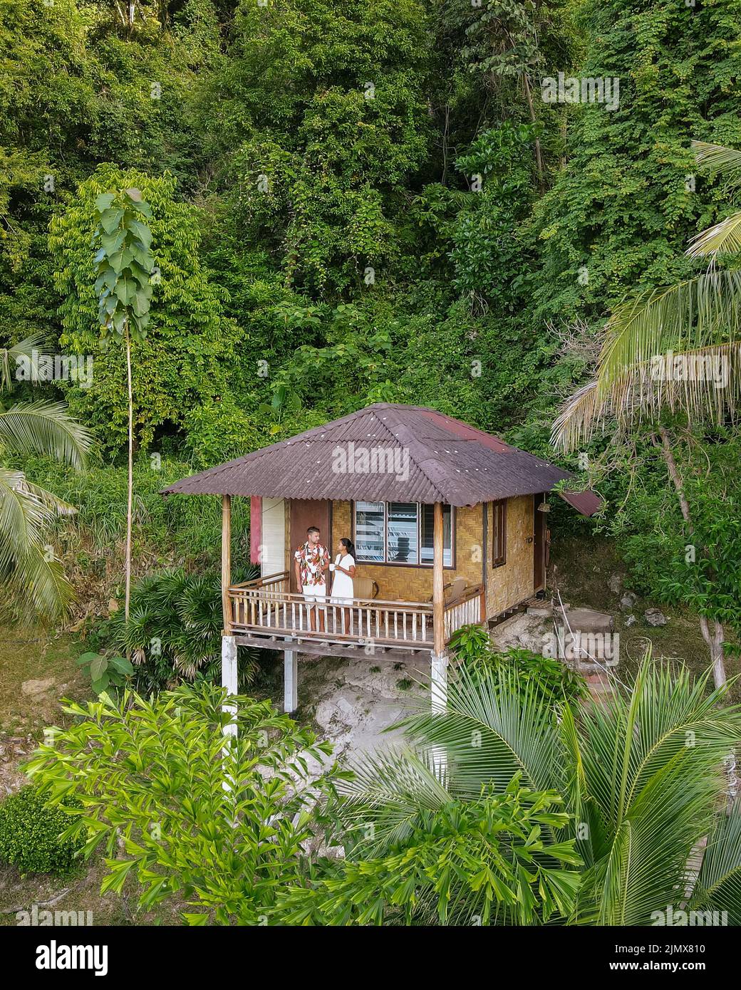 Railay beach Krabi Thailand, tropical beach of with backpacker bamboo hut in the jungle Stock Photo