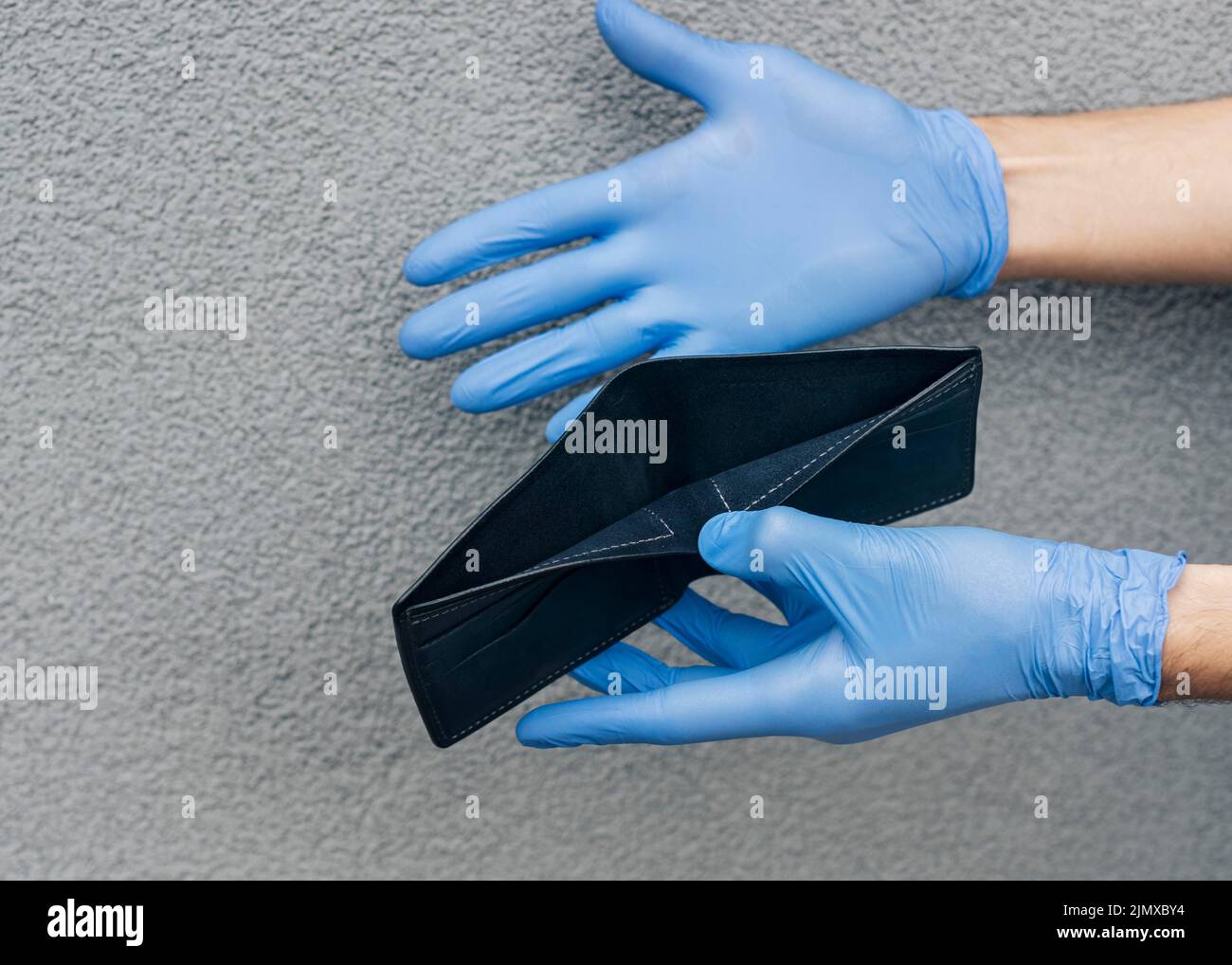Close up hands holding empty wallet Stock Photo