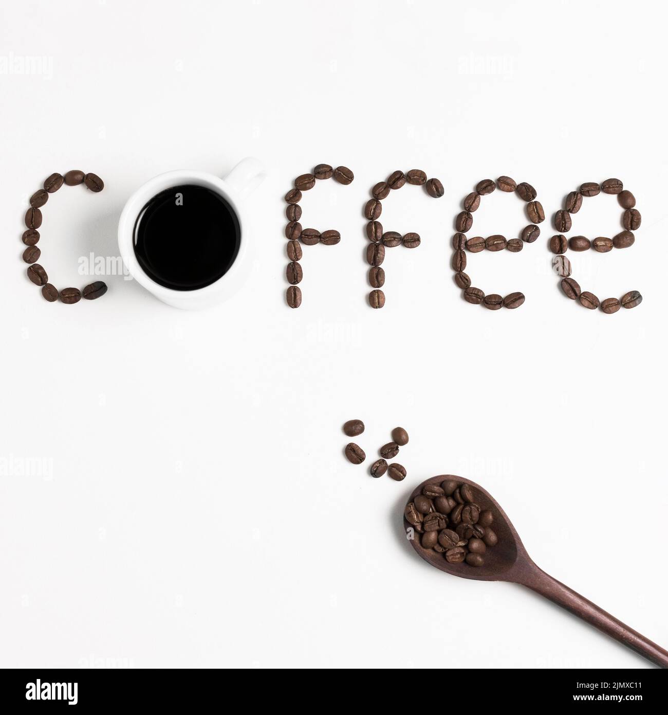Coffee word written with roasted coffee beans spoon Stock Photo