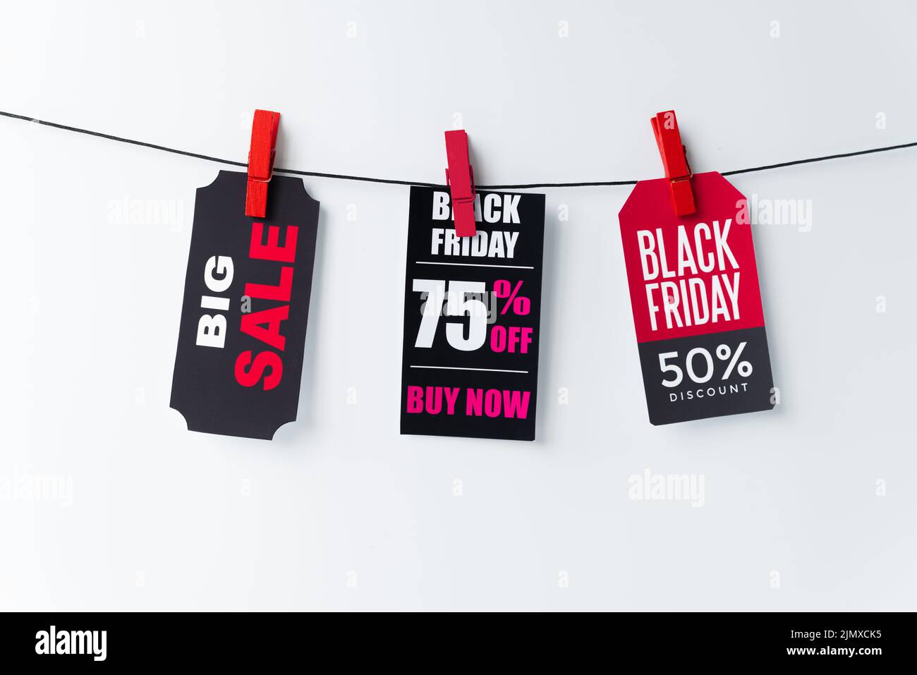 Collection hanging tags plain background Stock Photo Alamy