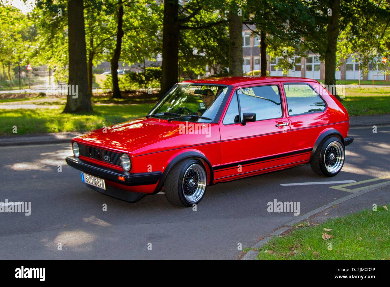 1983 80s Eighties Red VW Volkswagen Golf GTI Arriving At The Annual 1983 80s Eighties Red VW Volkswagen Golf GTI Arriving At The Annual
