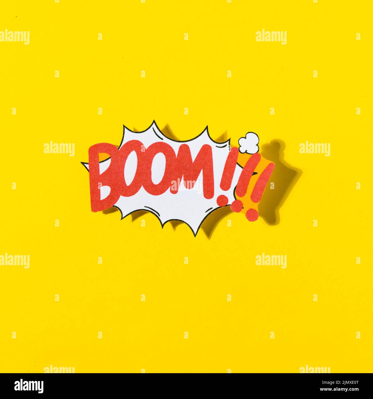 Boom cartoon illustration text retro pop art style yellow background Stock Photo