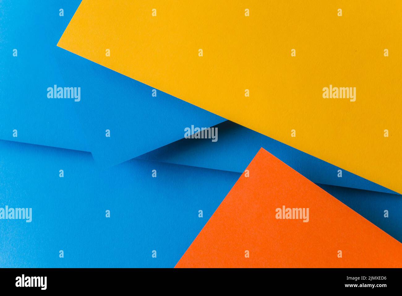 Blue orange yellow color papers background Stock Photo