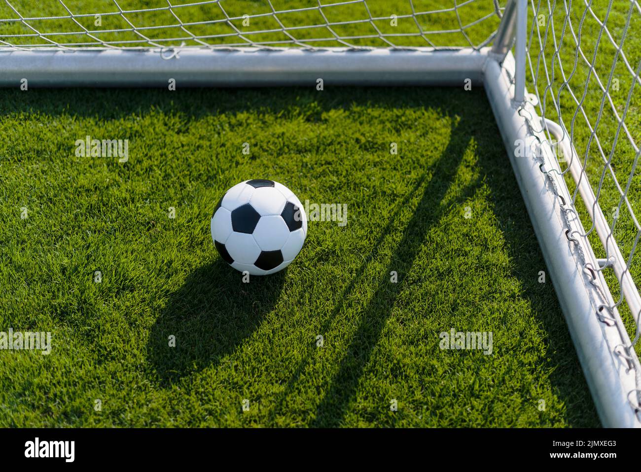 Ball goalpost soccer field Stock Photo