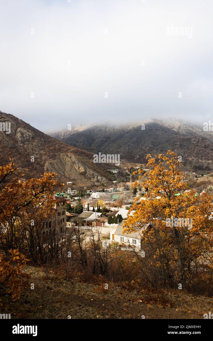 Autumn landscape, panorama of the village in the mountain valley ...
