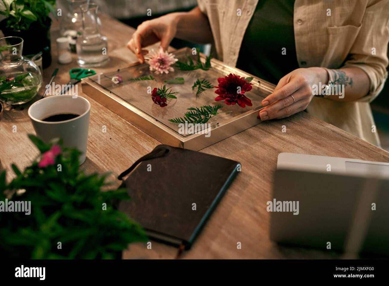 Theres no limit to her creativity. an unrecognizable florist decorating