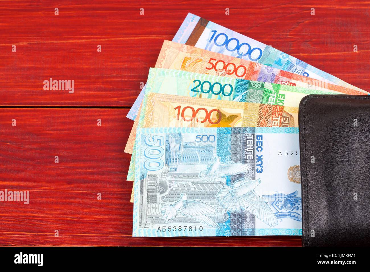 Kazakhstani tenge in the black wallet Stock Photo