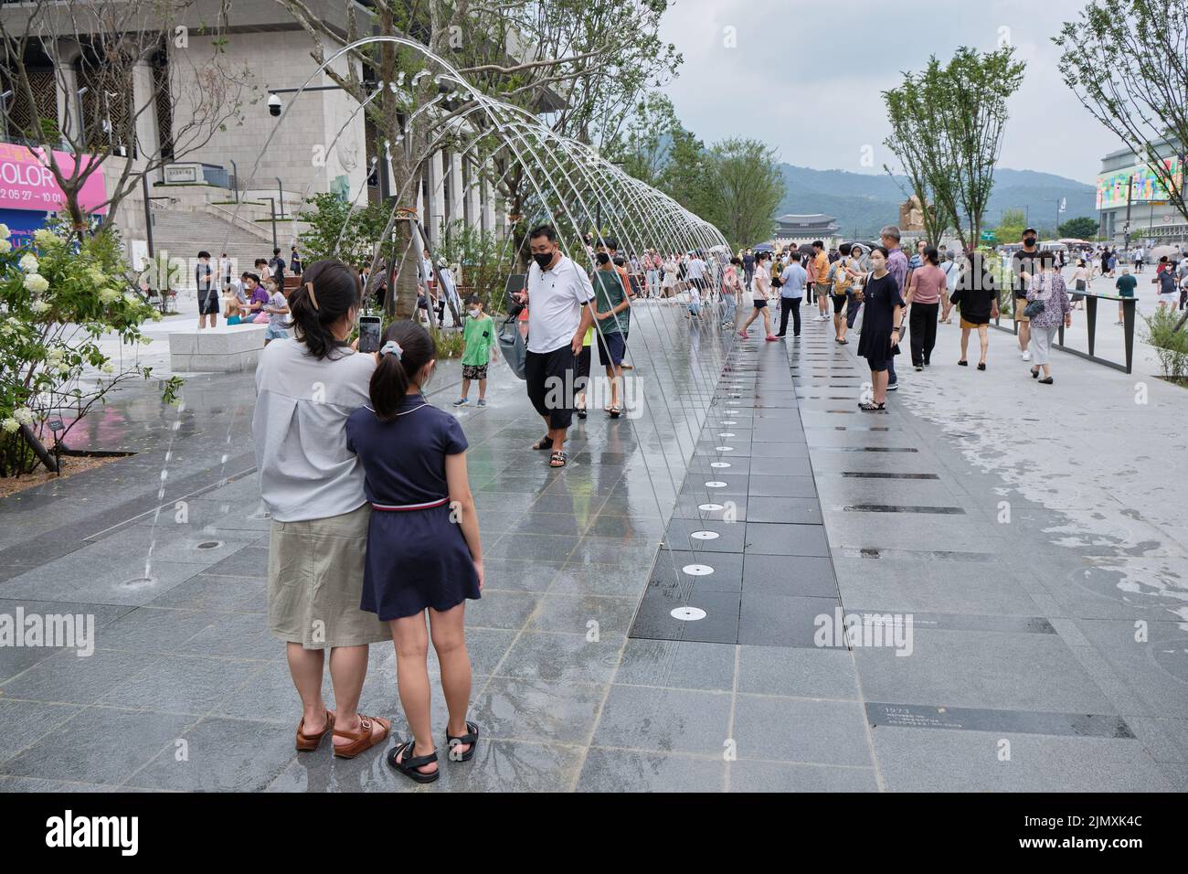 People visit newly reconstructed Gwanghwamun Square in central Seoul, South Korea on 7 August 2022 Stock Photo