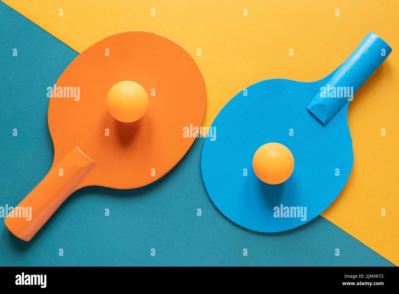 Top view two ping pong paddles with new balls Stock Photo Alamy