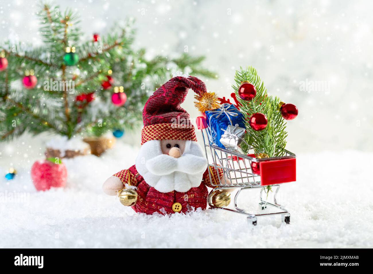 Christmas Santa Claus with shopping cart. Christmas composition. Stock Photo