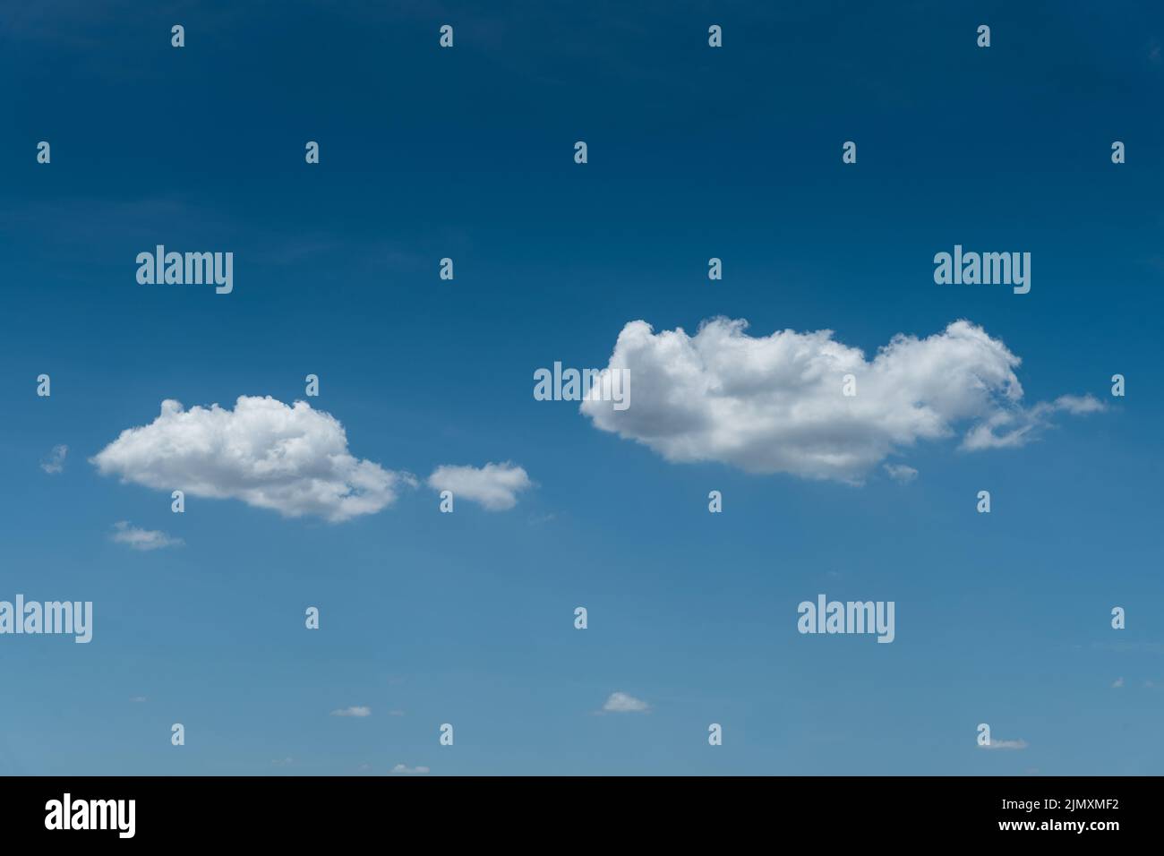 Minimal white cloud on blue sky background Stock Photo