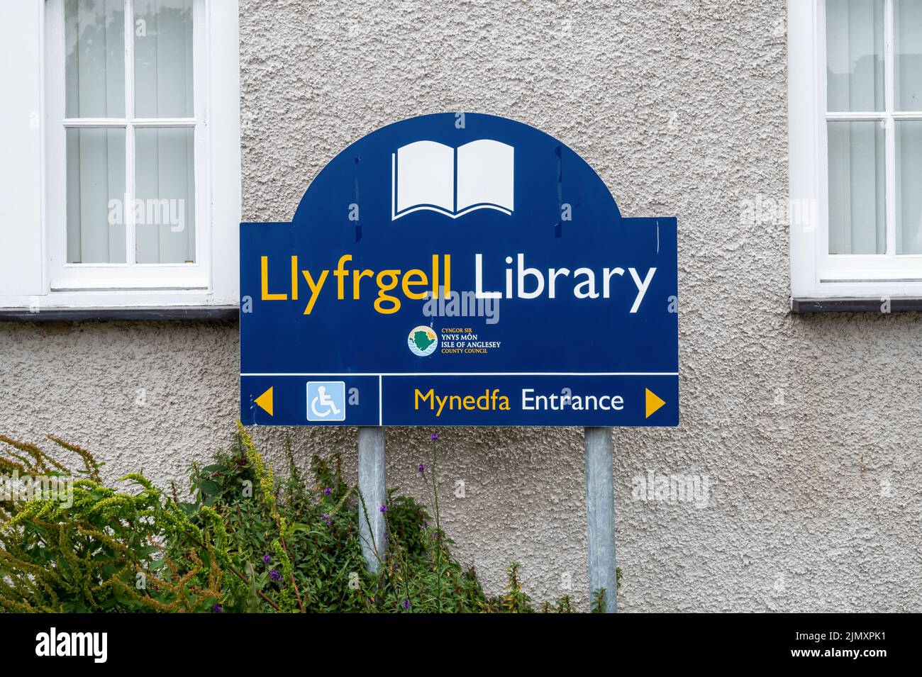 Beaumaris, UK- July 8, 2022: The sign for Llyfrgell Library in Beaumaris on the island of Anglesey Wales Stock Photo