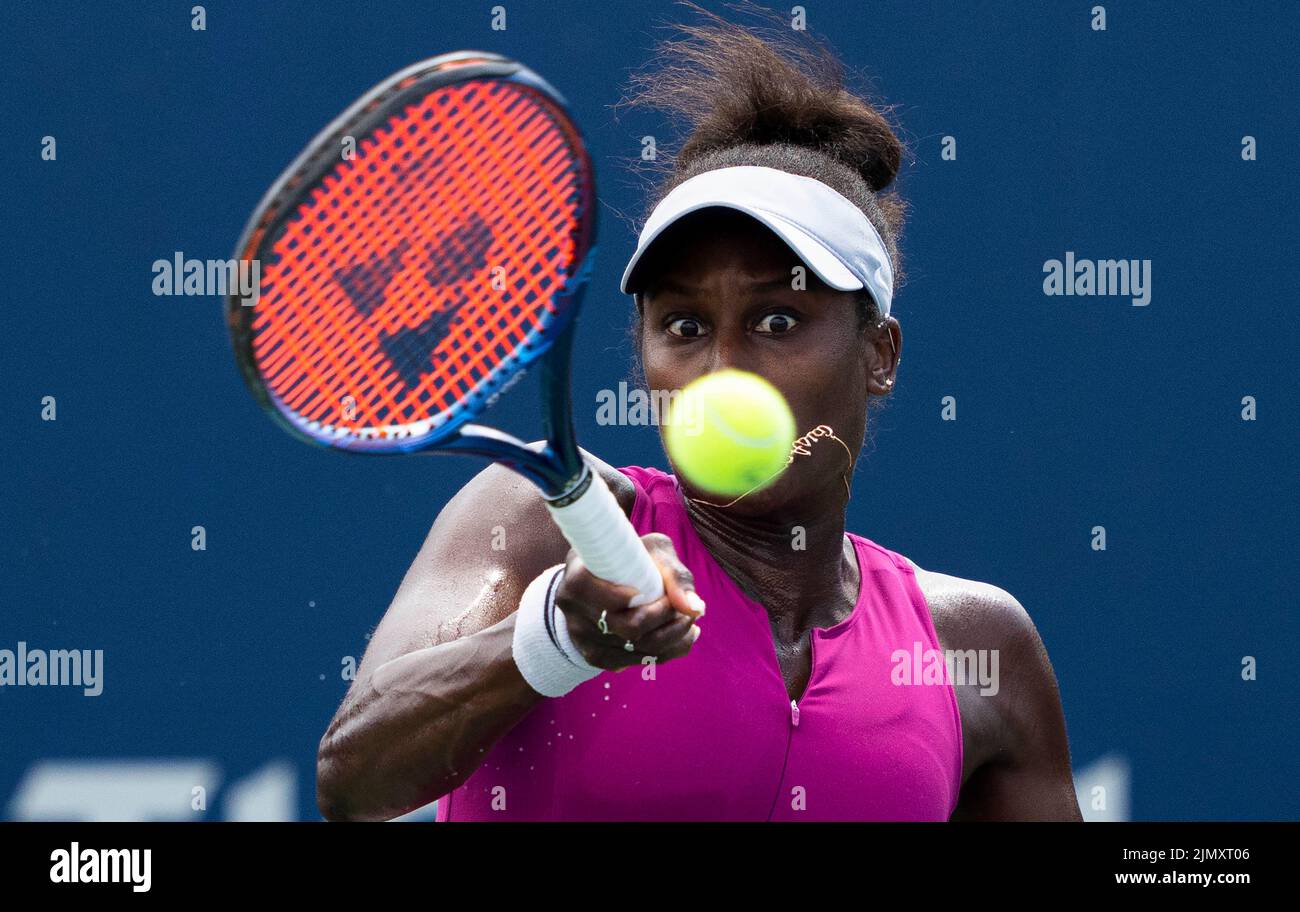 Toronto, Canada. 7th Aug, 2022. Asia Muhammad of the United States returns the ball against Donna Vekic of Croatia during the second round of women's singles qualifying match at the 2022 National Bank Open in Toronto, Canada, on Aug. 7, 2022. Credit: Zou Zheng/Xinhua/Alamy Live News Stock Photo