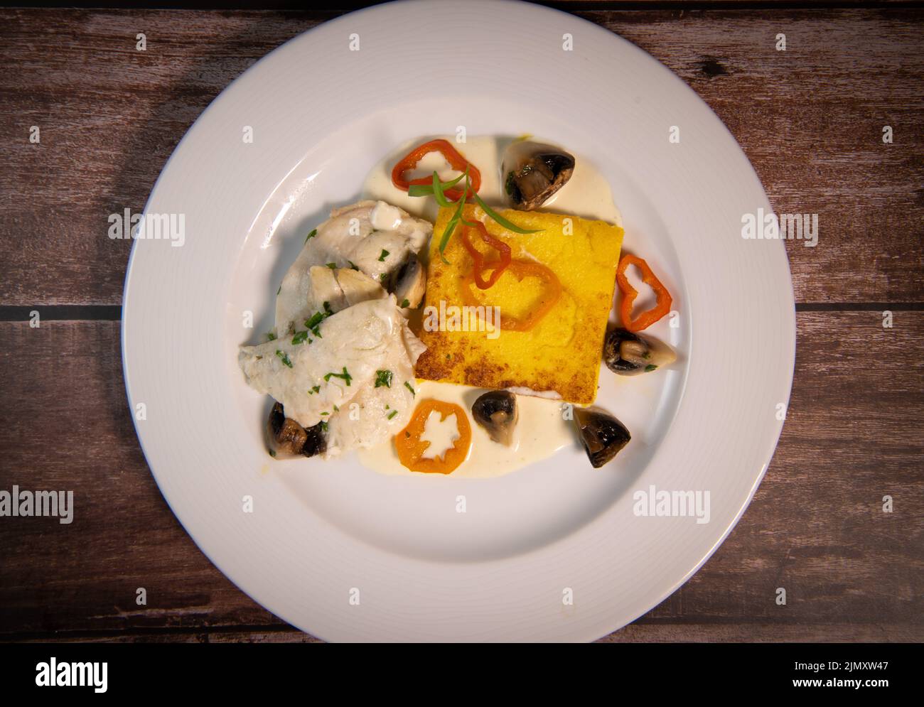 Recipe for sea bass fillet with fried polenta and white wine sauce